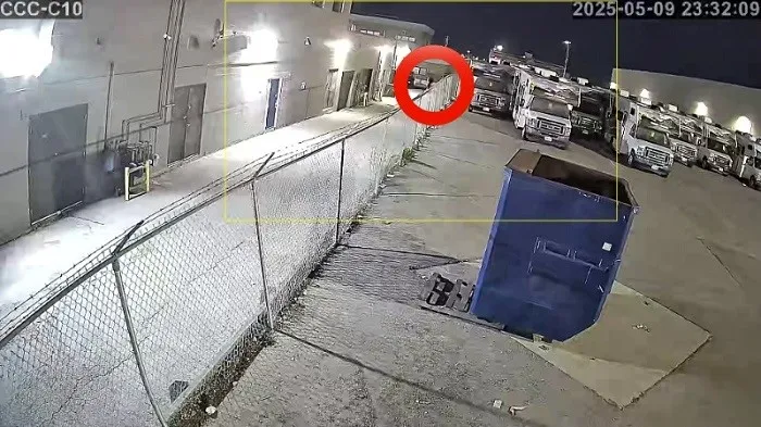 At 11:32 PM, security personnel regained visual contact with the intruder exiting the facility through an alley on the northeast side