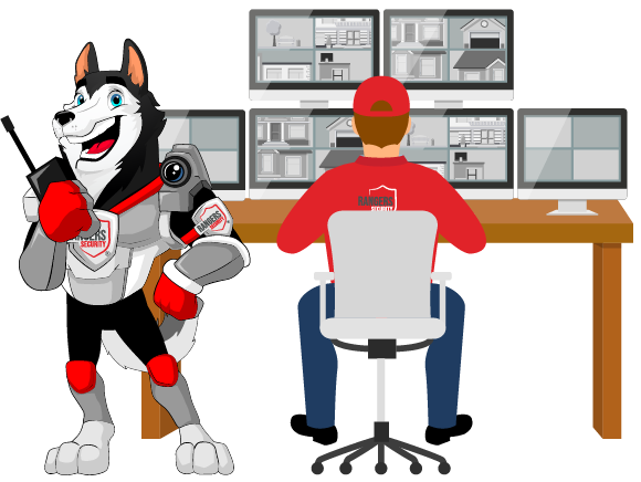 Security guard monitoring multiple surveillance screens, ensuring comprehensive security solutions for various sectors.